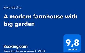 A Modern Farmhouse With Big Garden